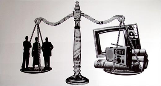 Legal scales overlaid with legal code. Lawyers on one side of the scales adn the other holds a TV, radio and newspaper.