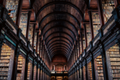 A dark library corridor